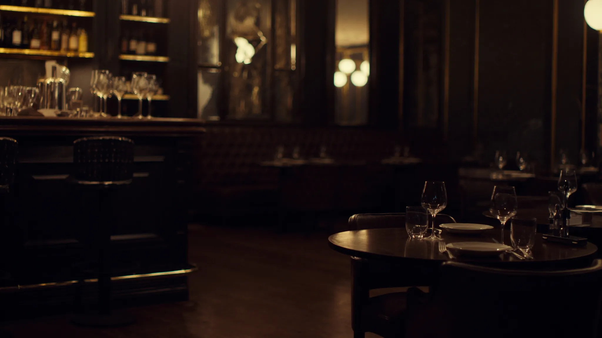 Warm, upscale restaurant interior in the evening